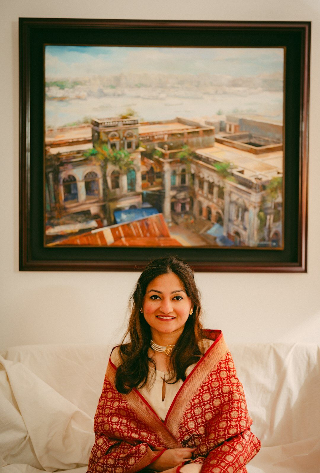 Studio portrait of a middle-aged Uruguayan woman in elegant business attire